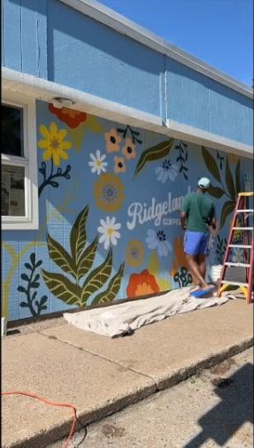 Abby painting a hand-painted mural on site — Scout Hill Co time-lapse