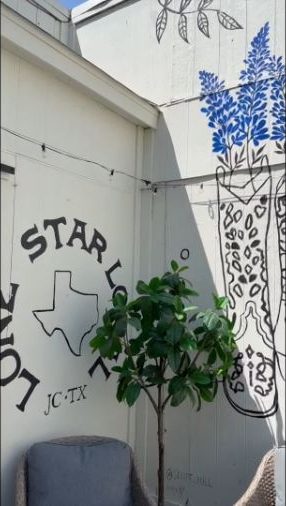 Abby painting a hand-painted mural on site — Scout Hill Co time-lapse